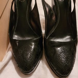 Prada cute sling back pumps.